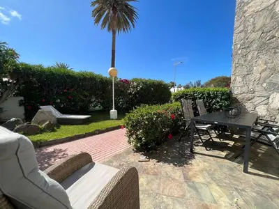 Jardín al aire libre en Puerto Rico duplex with community pool close to the beach