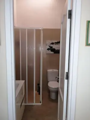 Un baño de Oasis Los Porches