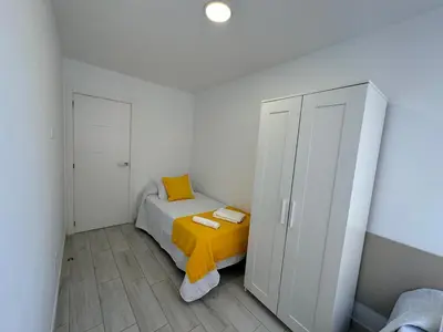 Cama o camas de una habitación en Vistas Plaza España centro ciudad Las Palmas