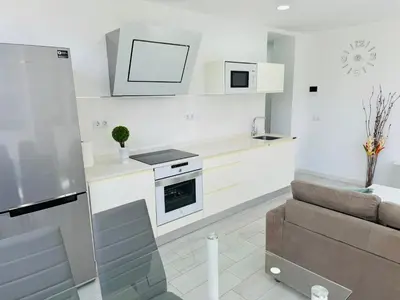 Una cocina o zona de cocina en Vistas Plaza España centro ciudad Las Palmas