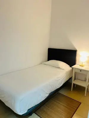 Cama o camas de una habitación en Comfortable Flat Near Las Canteras