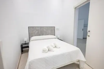 Cama o camas de una habitación en Deluxe Canteras Suites - by Gestión Vacacional Canarias