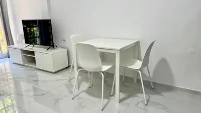 Una televisión o centro de entretenimiento en GRAN CANARIA Casa Magboss IV i V by Jacek Budek
