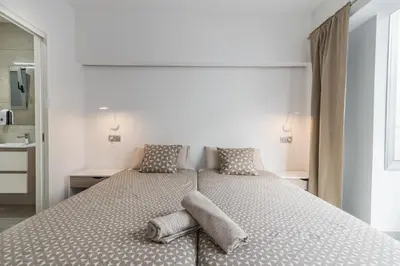 Cama o camas de una habitación en Escondite Sereno - 50m Las Canteras Beach