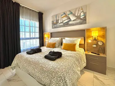 Cama o camas de una habitación en Cosy Bungalow Capri Maspalomas
