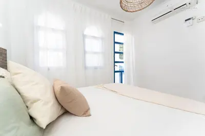 Cama o camas de una habitación en Isla Home