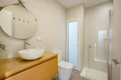 Un baño de Colorado Golf, Calma House - by Gestión Vacacional Canarias