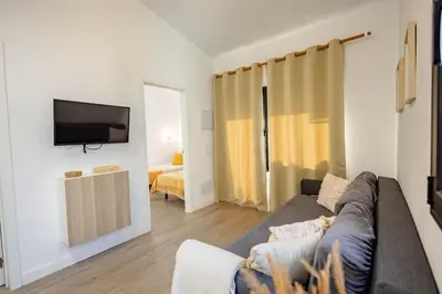 Una televisión o centro de entretenimiento en Colorado Golf, Calma House - by Gestión Vacacional Canarias
