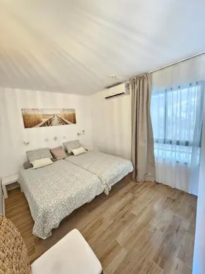 Cama o camas de una habitación en Canaima 112 Puerto Rico