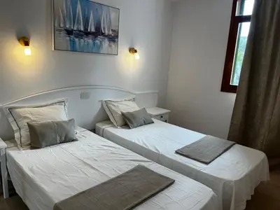 Cama o camas de una habitación en Zwischen Yumbo und zentralem Strand