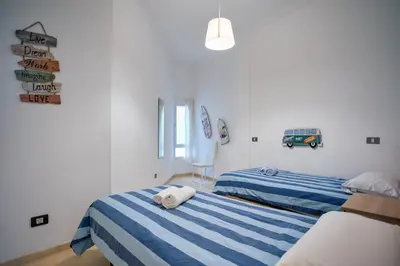 Cama o camas de una habitación en Canteras Beach Top Home