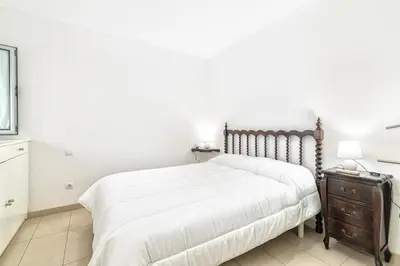 Cama o camas de una habitación en Comfortable Apartment with Terrace