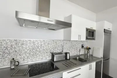 Una cocina o zona de cocina en Seafront Terrace Home 2BR Las Canteras Beach