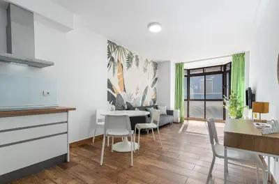 Zona de estar de Home2Book Cute Design Apt Las Canteras Beach