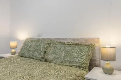 Cama o camas de una habitación en Home2Book Cute Design Apt Las Canteras Beach