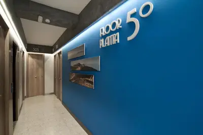 Una televisión o centro de entretenimiento en ApartHotel Idafe