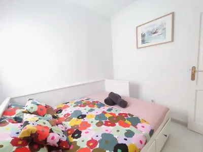 Cama o camas de una habitación en Pura Vida Beachfront Apartment
