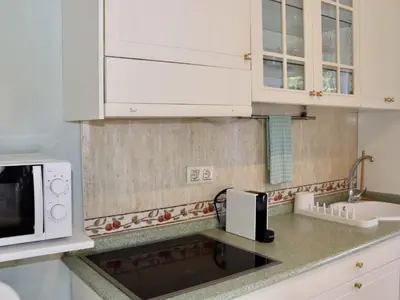 Una cocina o zona de cocina en House Deluxe Maspalomas