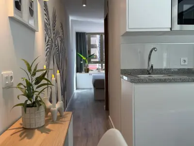 Una cocina o zona de cocina en Danubio Estudios 107
