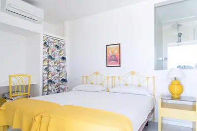 Cama o camas de una habitación en Villa Oasis Maspalomas