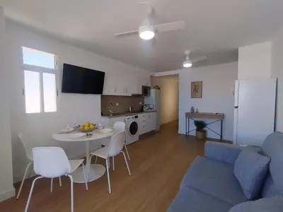 Una televisión o centro de entretenimiento en Syambeach Arguineguin