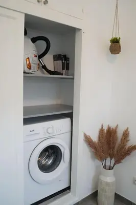 Una cocina o zona de cocina en Sunshine, Pool & Beach