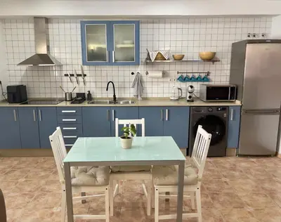 Una cocina o zona de cocina en FlatsBahiaArinaga En Playa de Arinaga con garaje