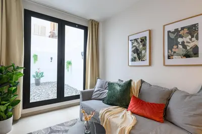 Zona de estar de Joyful Homes
