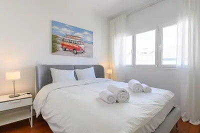 Cama o camas de una habitación en Cosy flat in the Heart of Triana