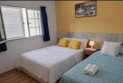 Cama o camas de una habitación en Arguineguin apartment terrace swimming pool