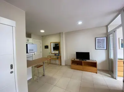Una televisión o centro de entretenimiento en Canteras Beach 40