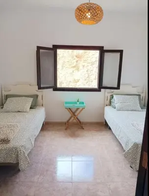 Cama o camas de una habitación en House La cabaa Galdar
