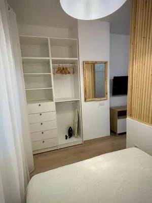 Cama o camas de una habitación en Álvaro Home con parking para turismo pequeño