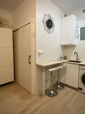 Una cocina o zona de cocina en Álvaro Home con parking para turismo pequeño