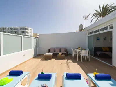 Un balcón o terraza de Seaside Home Playa del Ingles refurbished in 2024