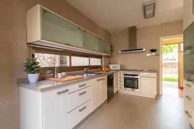 Una cocina o zona de cocina en Serenity Villa Tauro