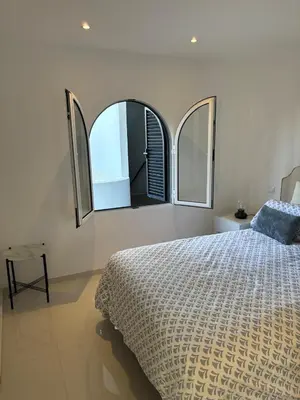 Cama o camas de una habitación en Primera línea Aquamarina Anfi del Mar