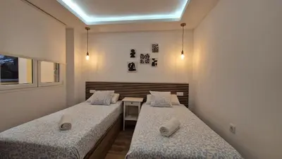 Cama o camas de una habitación en Rincón del Atlantico by 