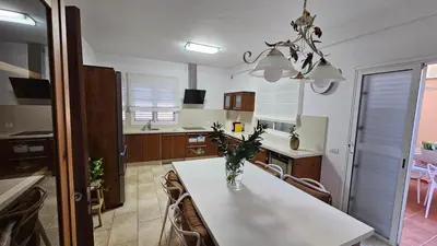 Una cocina o zona de cocina en Vv Sureste de Gran Canaria