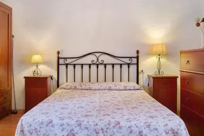 Cama o camas de una habitación en Tasarte by Villas Rivero