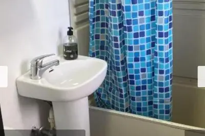 Un baño de Piscina club pasito blanco
