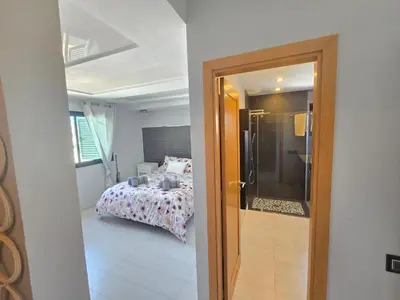 Cama o camas de una habitación en Oasis House