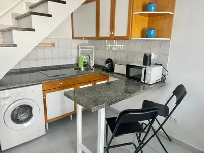Una cocina o zona de cocina en Cozy Bungalow playmar 23