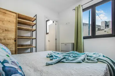 Cama o camas de una habitación en Telde City Loft With Solarium