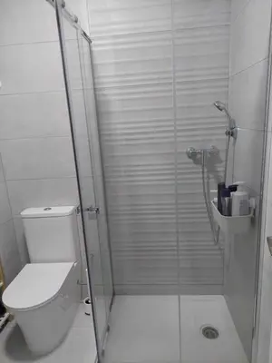 Un baño de Vico Holiday Homes