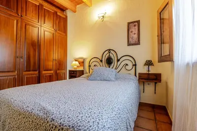 Cama o camas de una habitación en Casita Feliz - Casa Rural Tasarte by Villas Rivero