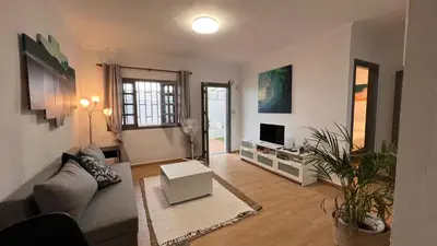 Una televisión o centro de entretenimiento en Mar y Sal Playa del Hombre