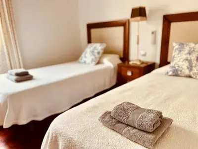 Cama o camas de una habitación en Jardín del Atlántico