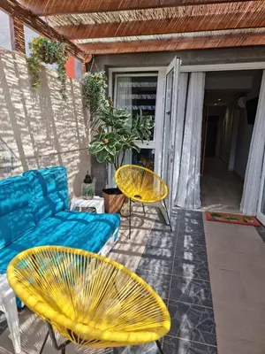 Zona de estar de casa CARIN