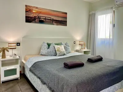 Cama o camas de una habitación en Casa Tucan - two bedrooms, heated pool, city and ocean views